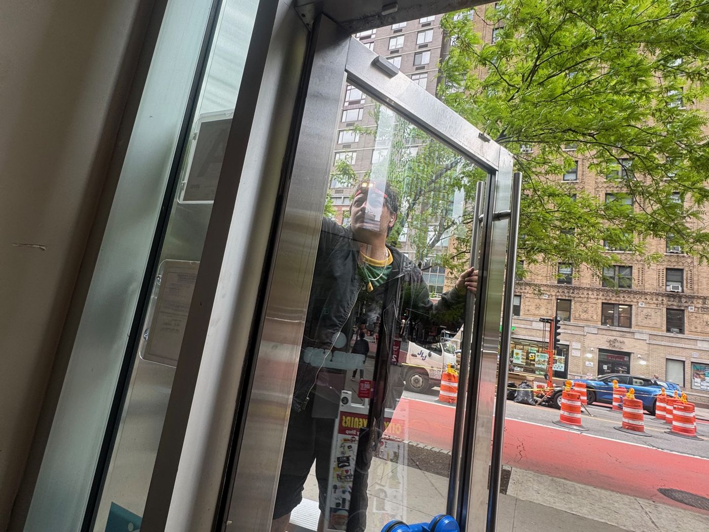 Rebuilding the glass storefront doors at a Times Square ice cream shop