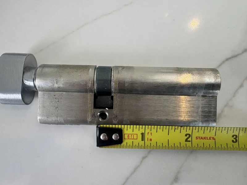 Euro profile thumbturn cylinder measured with a tape measure