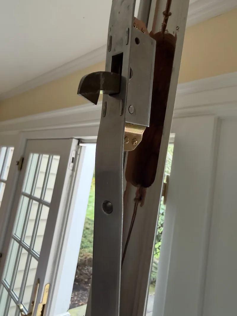 Multipoint swing hook bolt extended from a removed lock case