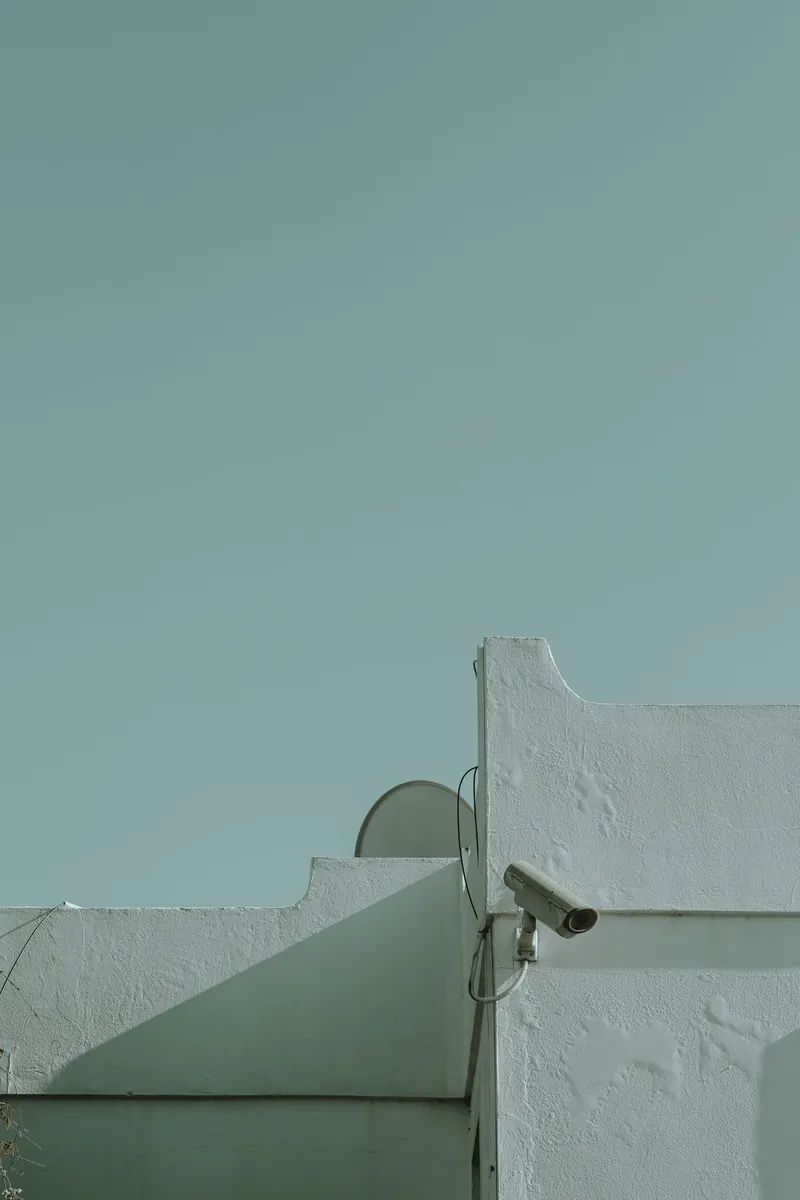 Security camera mounted on a building exterior